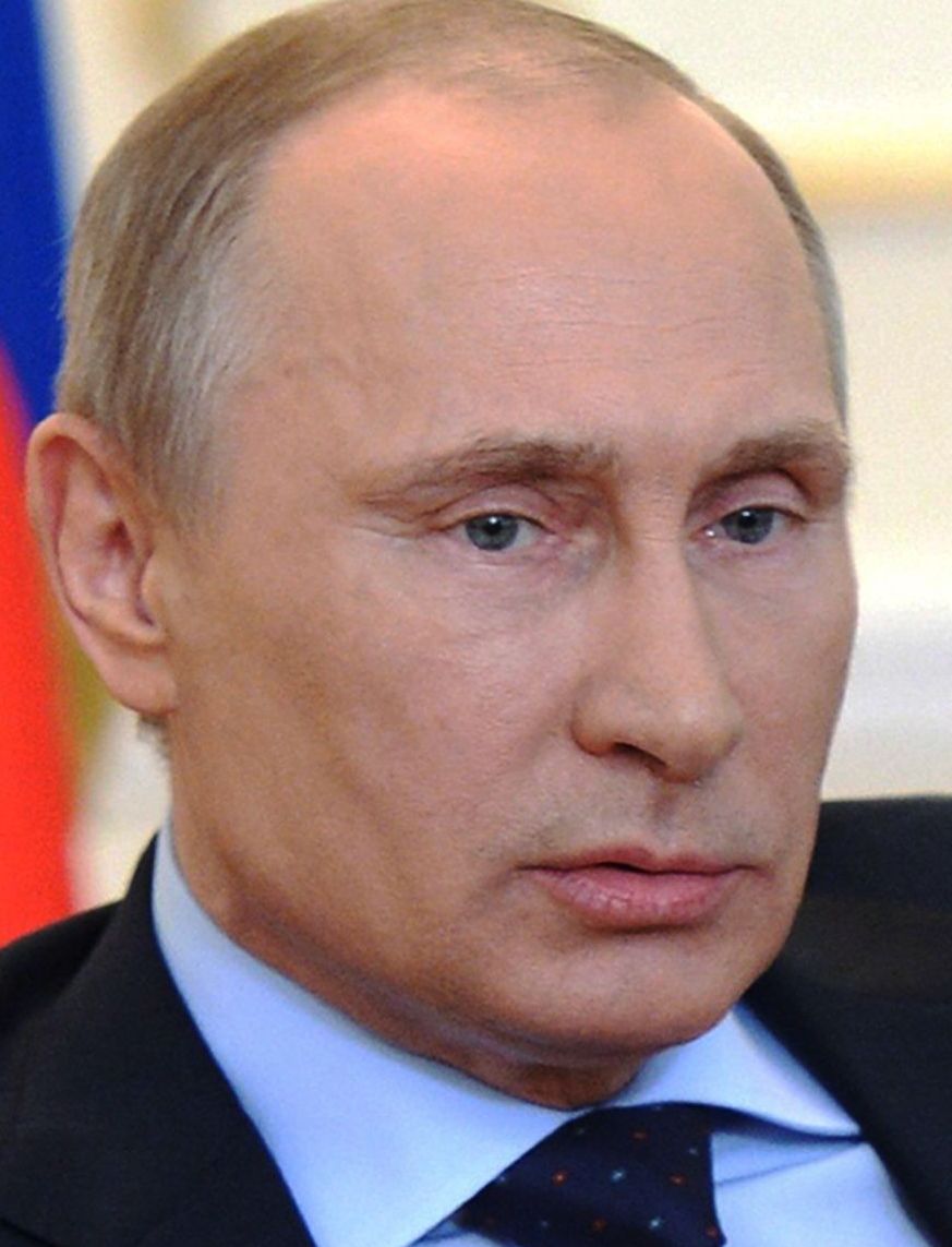 Putin talks tough but cools tensions over Ukraine