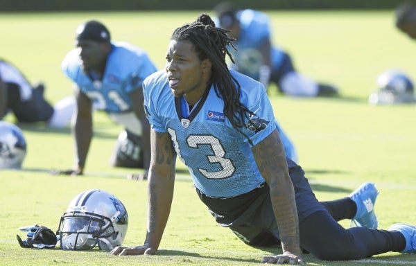 Carolina Panthers wide receiver Kelvin Benjamin (13) is tackled by