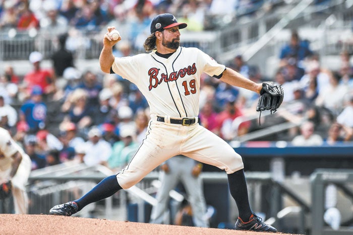 Another Phillips homer lifts Braves over Brewers