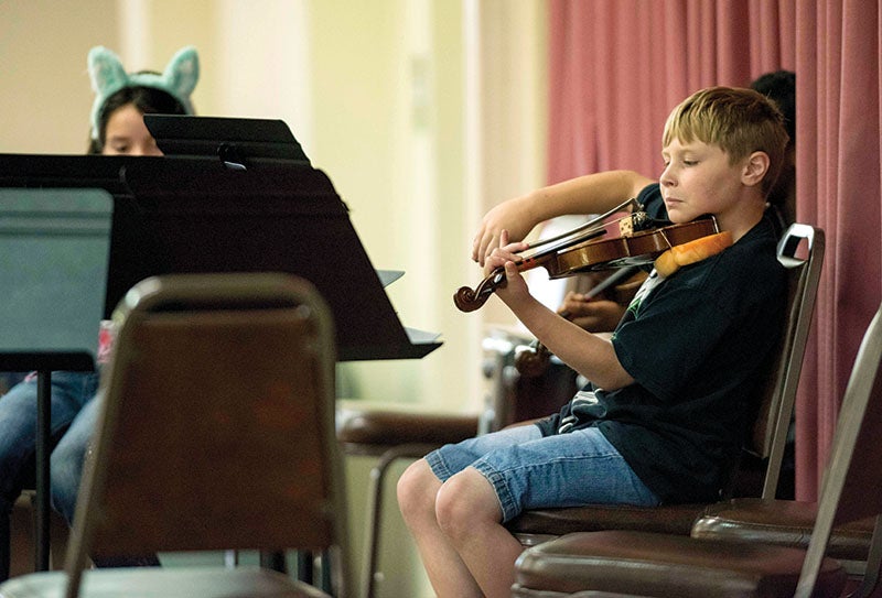 Just a stringin' Symphony's summer camp teaches students about music