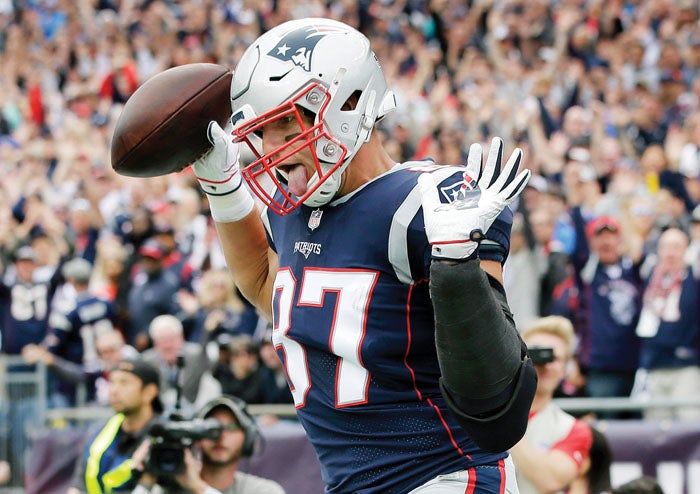 New England Patriots' Rob Gronkowski (87) makes a touchdown