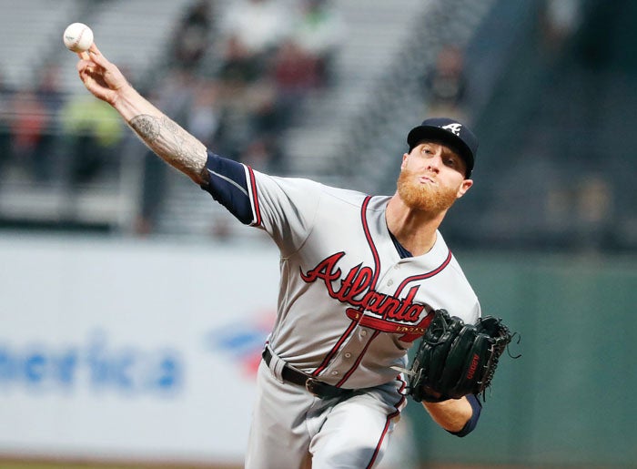 Photos: Pitching fails Braves in loss to Giants