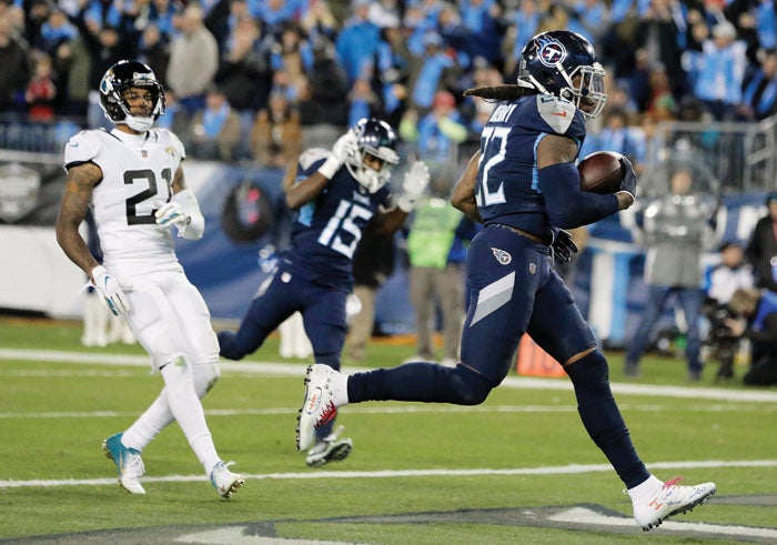 Henry runs into NFL record book as Titans rout Jaguars