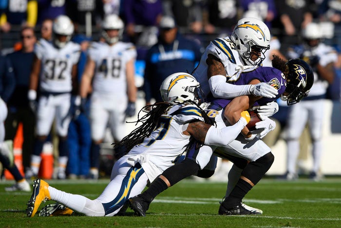 Chargers hold off Jackson, Ravens 23-17 in playoff opener