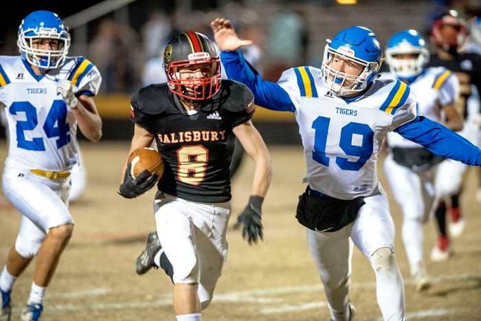 High school football: Hornets dominate first-round home game ...