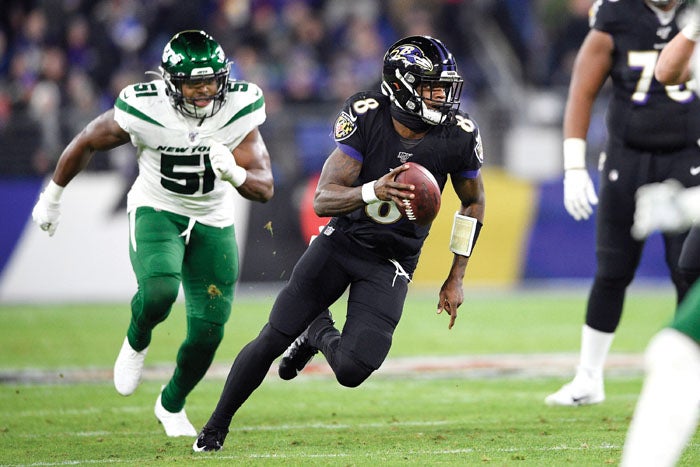 Jackson, Ravens Beat Jets 42-21 To Clinch AFC North Title