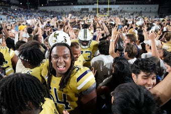 college football fans cheering